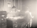Early Twentieth-Century author at her desk